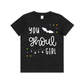 Black t-shirt with  purple, green and orange stars with white vinyl that says You Ghoul Girl. A white bat and white spider web.